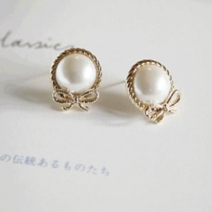 faux pearl and bow earrings